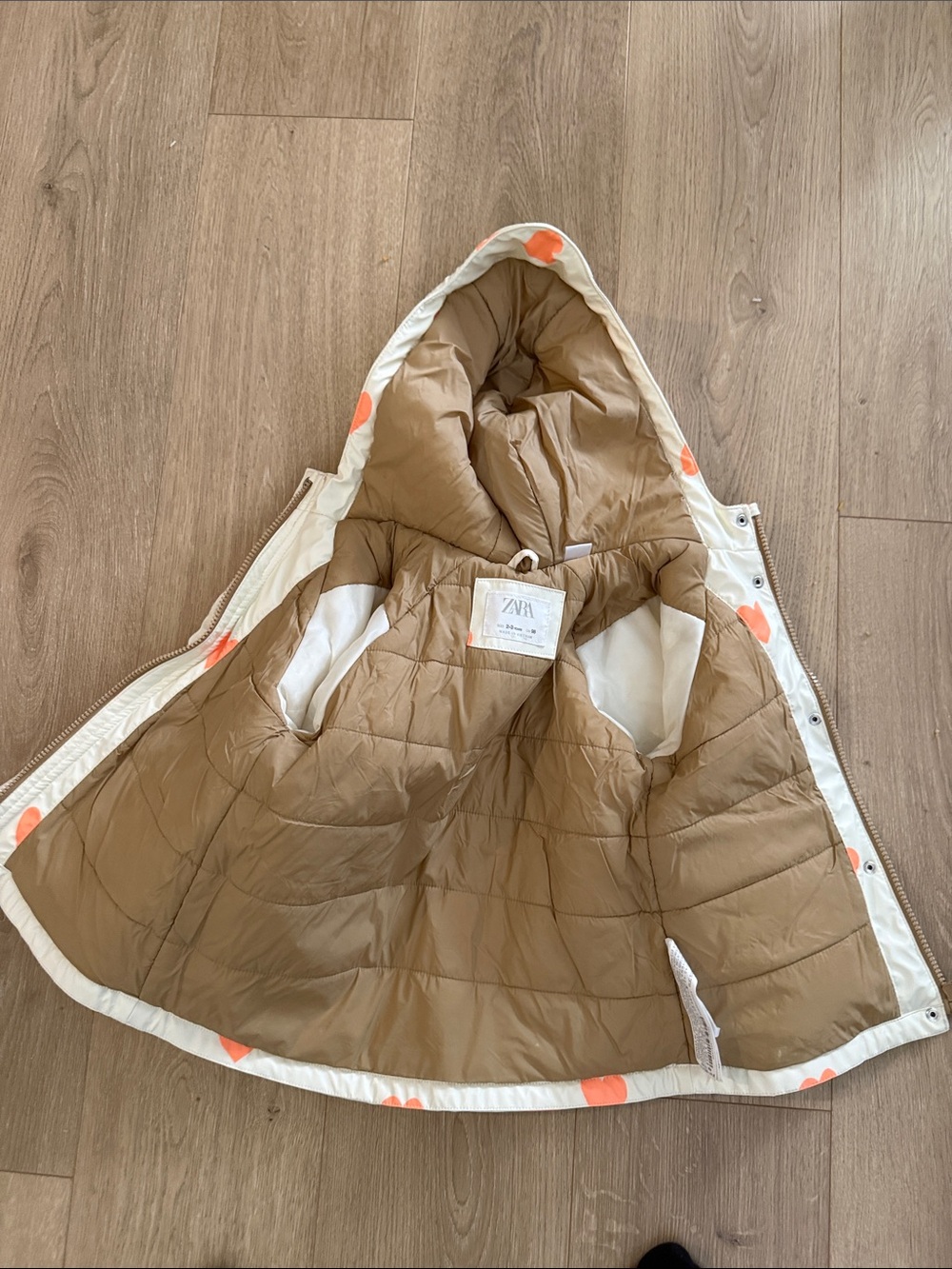 Zara Kids Cream Hooded Puffer with Tan Interior and Orange Dot Accents